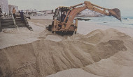 Hace 25 años | A Coruña instala por primera vez una duna en la playa para proteger el Paseo Marítimo